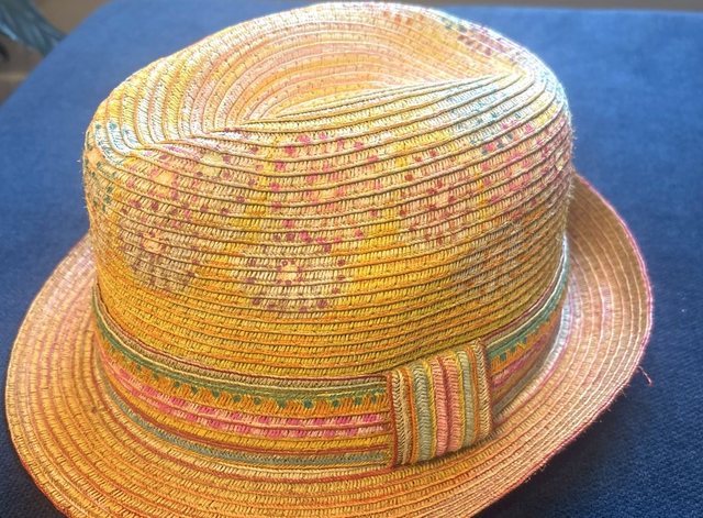 Hand-painted pastel straw fedora with a multicolor woven band