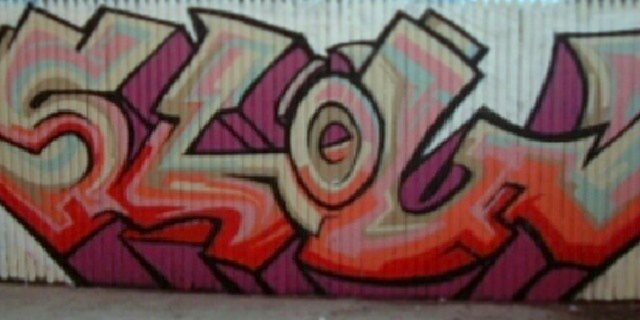 Large outdoor SLOW graffiti mural