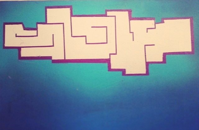 White and purple SLOW tag on a blue field